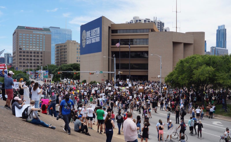 Crowd protesting in front of Austin Police headquarters